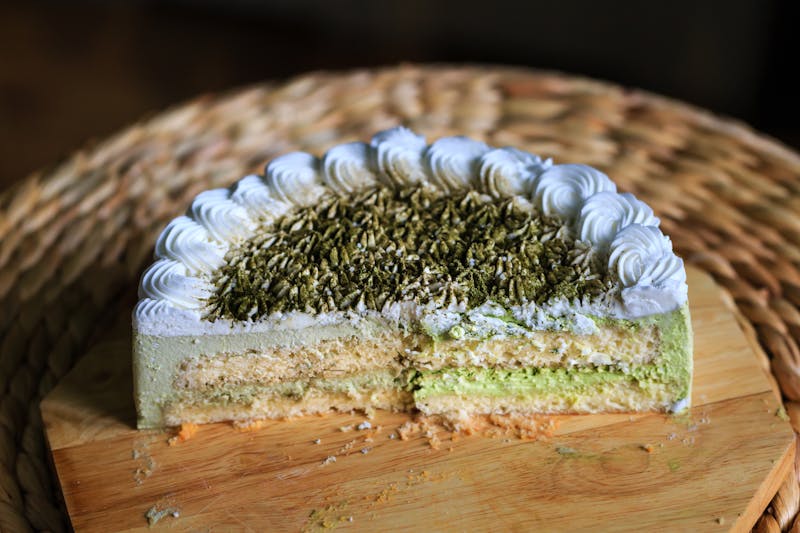 Tres Leches Cake slice with whipped cream